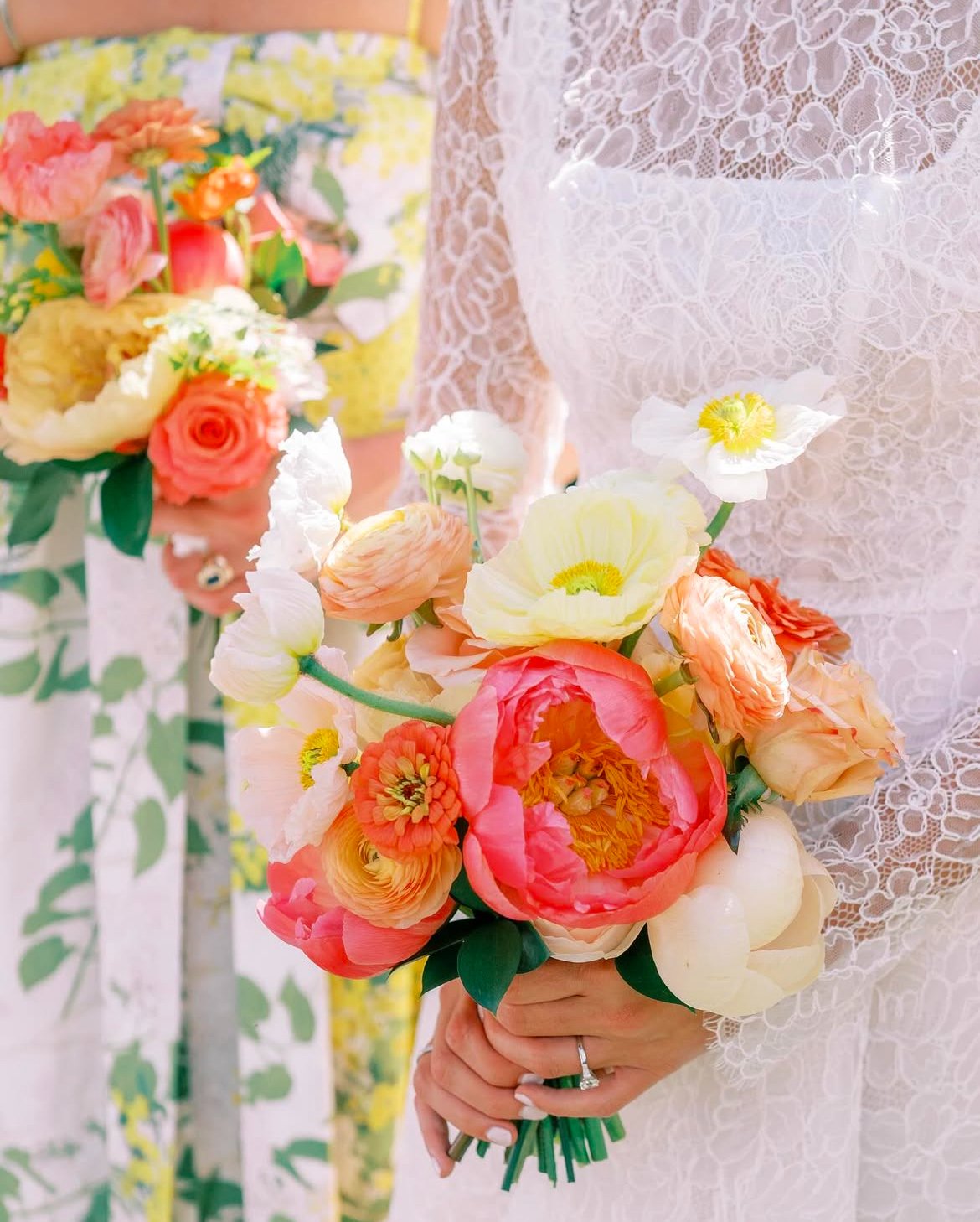 Classic bride holding colorful wedding bouquet